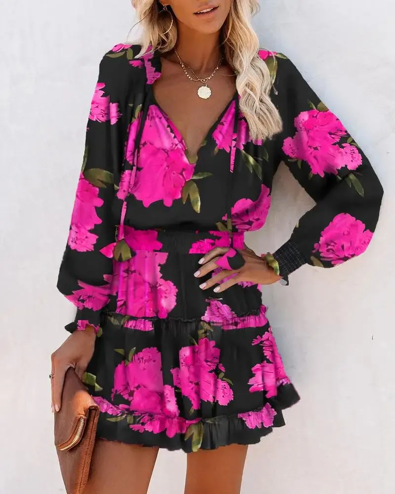 Flirty Floral Mini Patchwork Dress – Long Sleeve V-Neck Ruffle Waist for Springtime Charm