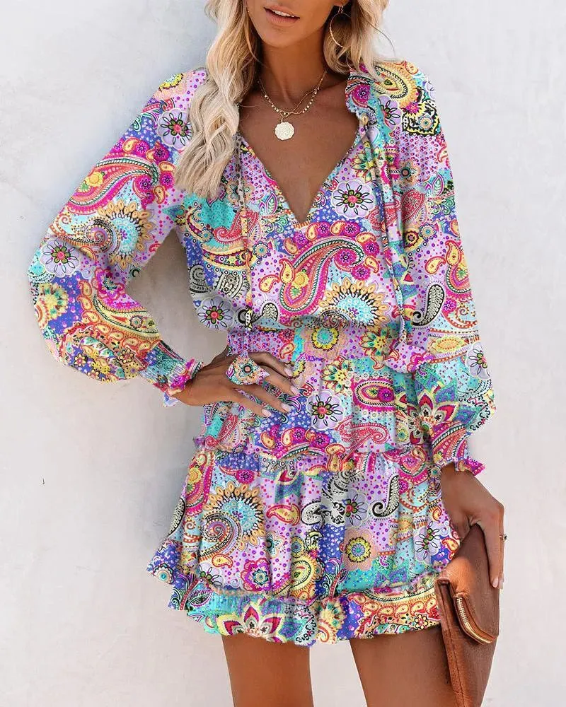 Flirty Floral Mini Patchwork Dress – Long Sleeve V-Neck Ruffle Waist for Springtime Charm