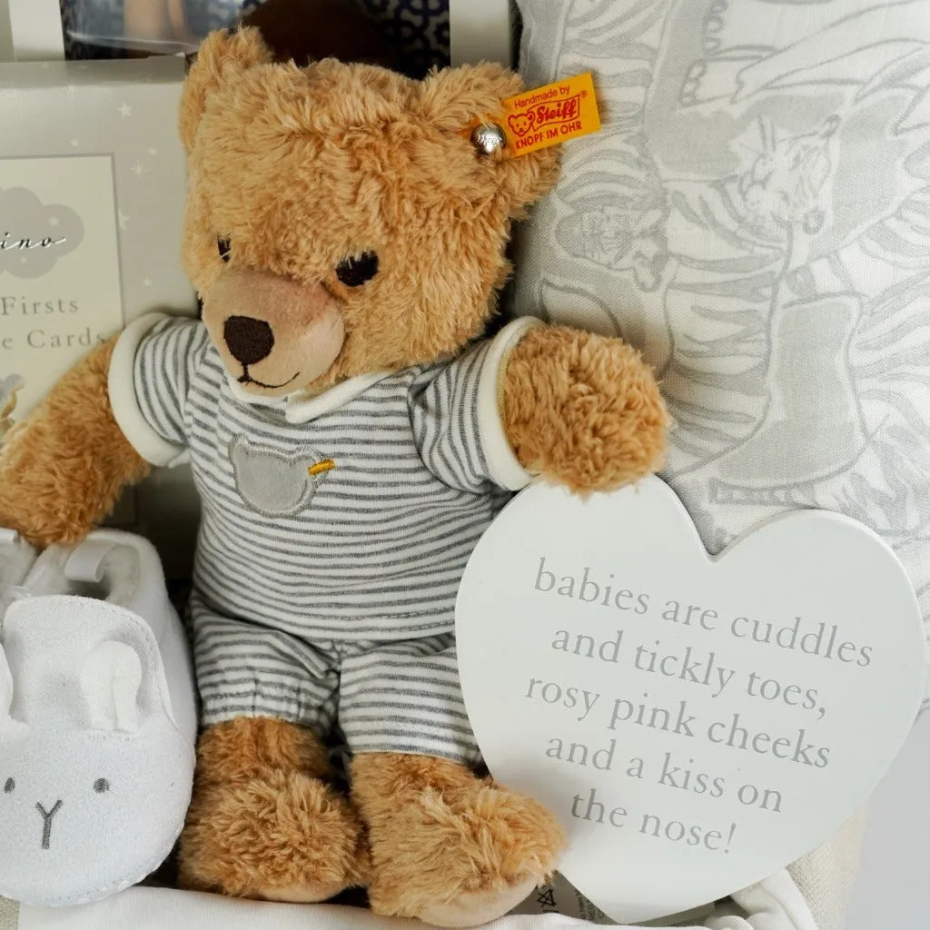 Neutral Baby Gift Hamper Basket, Steiff Teddy Bear, Marie-Chantal Baby Clothing Set, Al'Thir Camel By Sophie Le Giraffe, Aiden And Anais Dream Blanket.
