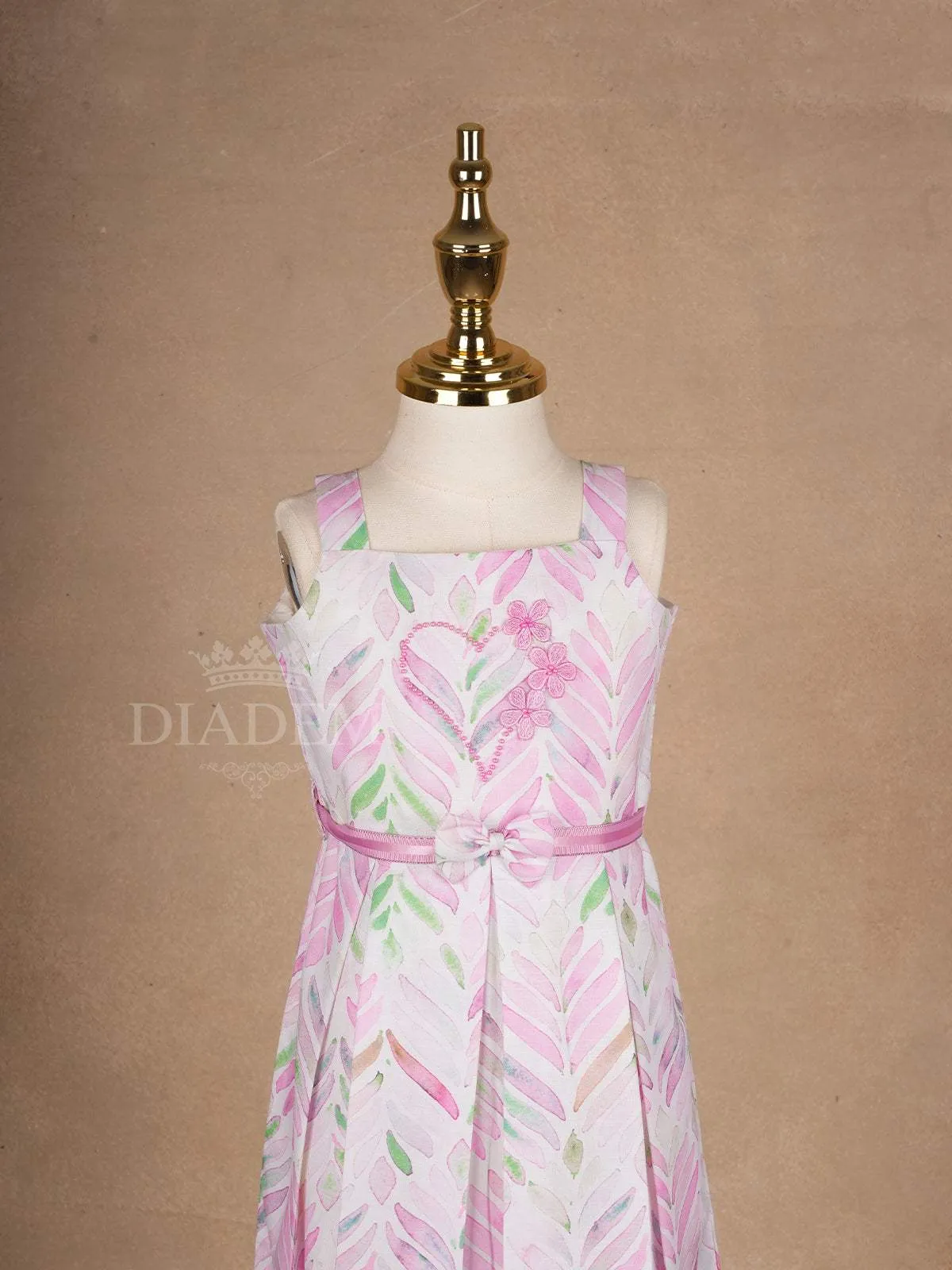 White Cotton Frock Adorned with Floral and Leaves Pattern and Sleeveless for Girls