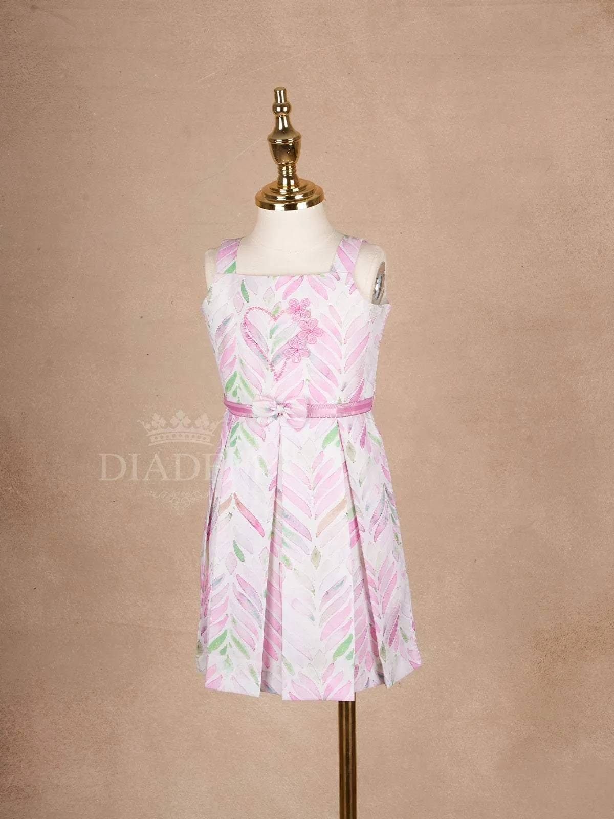White Cotton Frock Adorned with Floral and Leaves Pattern and Sleeveless for Girls